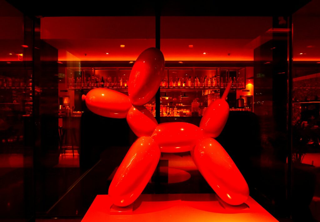 Image of a iridescent porcelain work akin to the balloon dog works by Jeff Koons. Specialist art insurance for collectors can help protect collected ceramic works